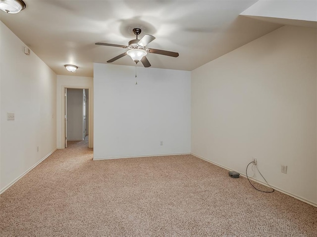 2909 Marigold Ln, Edmond, OK 73013 - spare room featuring a ceiling fan and light colored carpet