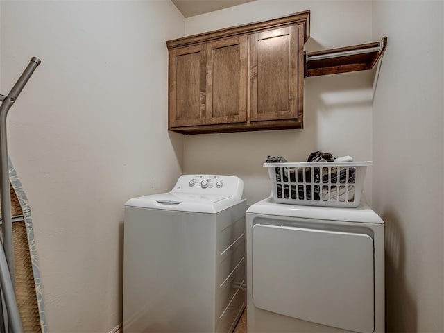 2909 Marigold Ln, Edmond, OK 73013 - washroom with washing machine and dryer and cabinet space