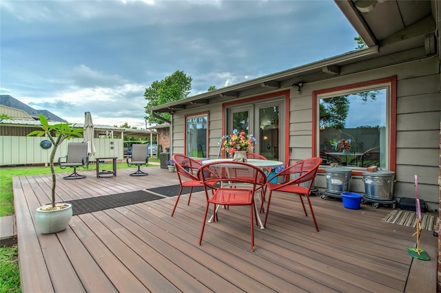 15700 N Western Ave, Edmond, OK 73013 - wooden deck featuring outdoor dining space