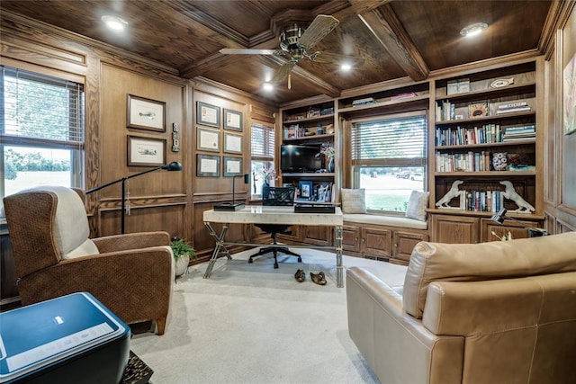 15700 N Western Ave, Edmond, OK 73013 - home office featuring a wood ceiling with exposed beams, crown molding, a ceiling fan, wood walls, and plenty of natural light