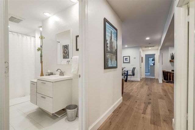 15700 N Western Ave, Edmond, OK 73013 - corridor with light wood finished floors and recessed lighting