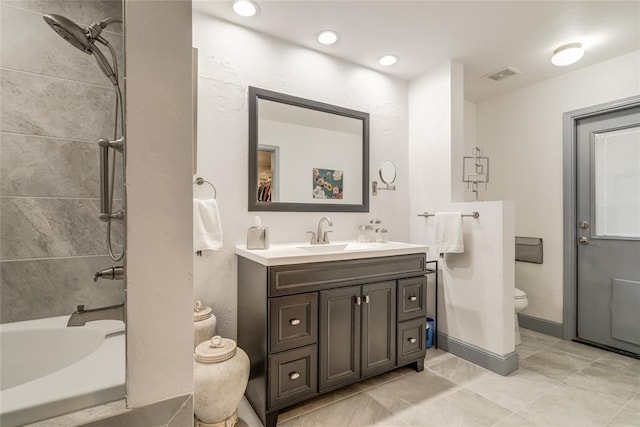15700 N Western Ave, Edmond, OK 73013 - bathroom with vanity,  shower combination, and recessed lighting