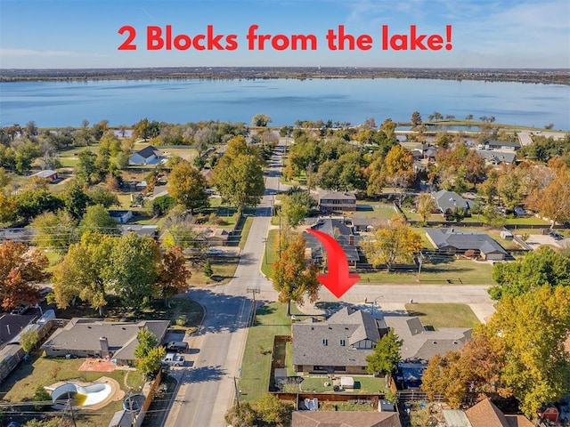 3100 N Eagle Ln, Bethany, OK 73008 - aerial view of property's location with a large body of water and nearby suburban area