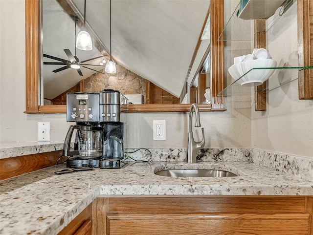 3100 N Eagle Ln, Bethany, OK 73008 - kitchen featuring lofted ceiling, brown cabinets, open shelves, a ceiling fan, and light stone counters