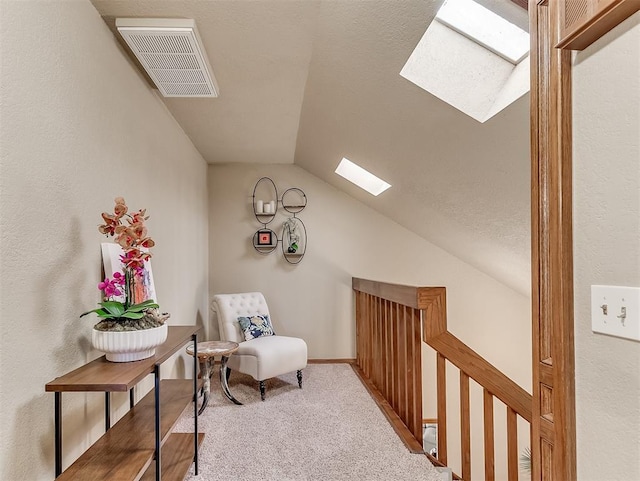 3100 N Eagle Ln, Bethany, OK 73008 - living area with a skylight, vaulted ceiling, carpet, and an upstairs landing