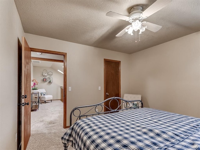 3100 N Eagle Ln, Bethany, OK 73008 - bedroom featuring light carpet, a textured ceiling, and ceiling fan