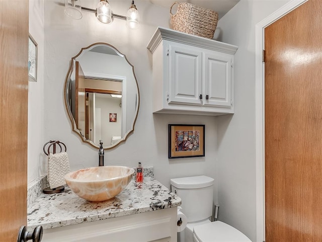 3100 N Eagle Ln, Bethany, OK 73008 - bathroom featuring toilet and vanity