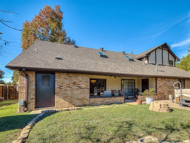 3100 N Eagle Ln, Bethany, OK 73008 - rear view of house with roof with shingles, brick siding, and a patio
