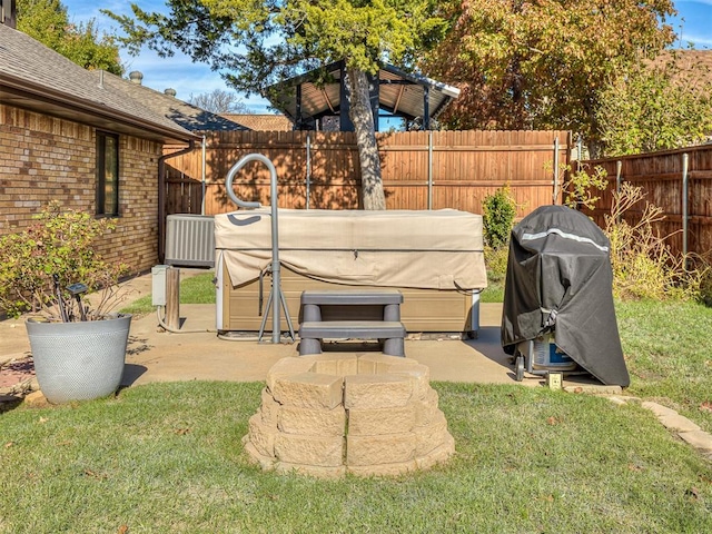 3100 N Eagle Ln, Bethany, OK 73008 - fenced backyard featuring a hot tub and a patio