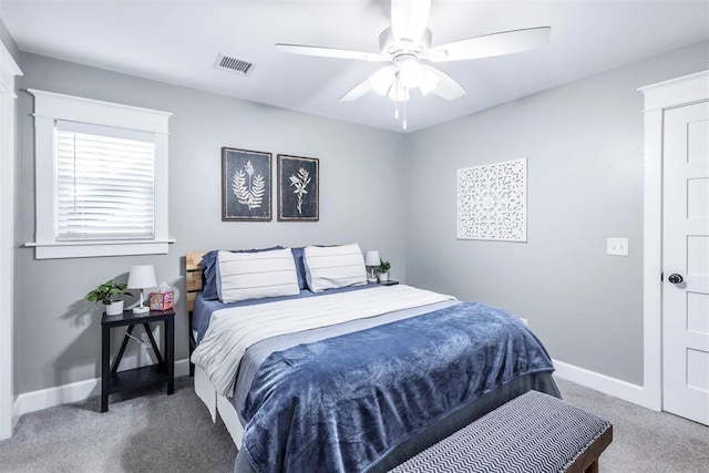 1218 N Brookline Ave, Oklahoma City, OK 73107 - carpeted bedroom featuring baseboards and a ceiling fan