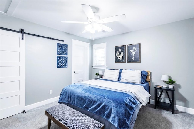 1218 N Brookline Ave, Oklahoma City, OK 73107 - carpeted bedroom featuring a barn door and ceiling fan