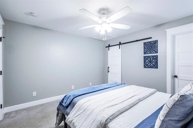 1218 N Brookline Ave, Oklahoma City, OK 73107 - carpeted bedroom featuring a barn door and a ceiling fan
