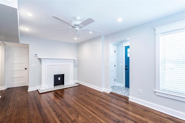 1218 N Brookline Ave, Oklahoma City, OK 73107 - unfurnished living room featuring a ceiling fan, a fireplace, wood finished floors, and recessed lighting
