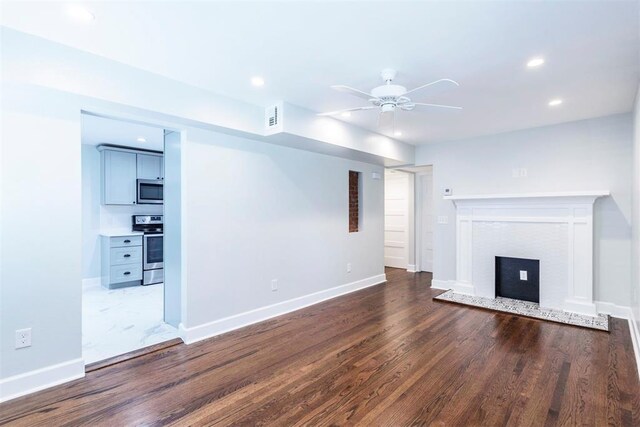 1218 N Brookline Ave, Oklahoma City, OK 73107 - unfurnished living room with a ceiling fan, wood finished floors, recessed lighting, and a fireplace
