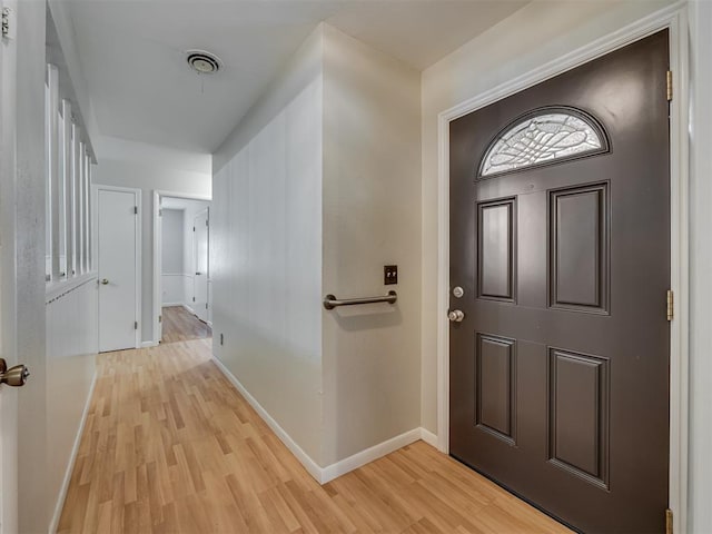 5936 N Ione Dr, Oklahoma City, OK 73122 - foyer entrance featuring light wood-style floors