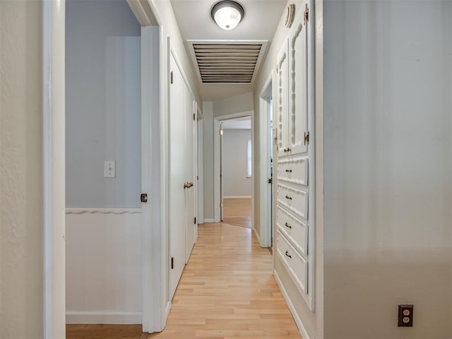 5936 N Ione Dr, Oklahoma City, OK 73122 - hall with light wood-type flooring and baseboards