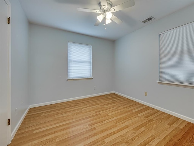 5936 N Ione Dr, Oklahoma City, OK 73122 - spare room with light wood finished floors and ceiling fan