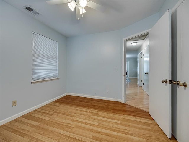 5936 N Ione Dr, Oklahoma City, OK 73122 - empty room with a ceiling fan and light wood finished floors