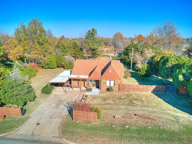 5905 NW 50th St, Oklahoma City, OK 73122 - view of front of house featuring concrete driveway and a carport