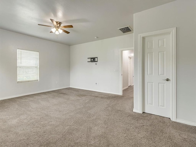 837 SE 68th St, Oklahoma City, OK 73149 - carpeted spare room featuring ceiling fan and baseboards