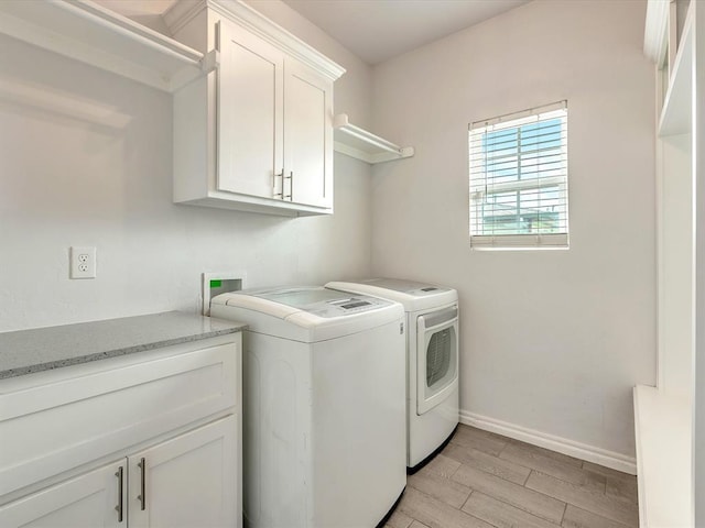837 SE 68th St, Oklahoma City, OK 73149 - laundry room with cabinet space, independent washer and dryer, and light wood-style floors