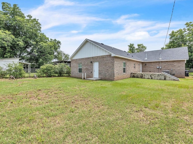 837 SE 68th St, Oklahoma City, OK 73149 - back of property with brick siding and board and batten siding