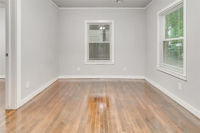 1617 SW 31st St, Oklahoma City, OK 73119 - unfurnished room with hardwood / wood-style flooring and ornamental molding