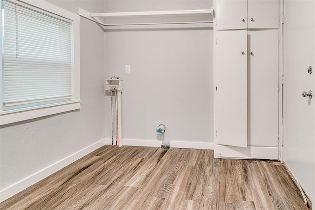 1617 SW 31st St, Oklahoma City, OK 73119 - washroom featuring wood finished floors and baseboards