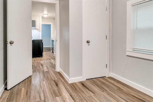 1617 SW 31st St, Oklahoma City, OK 73119 - hallway with wood finished floors and baseboards