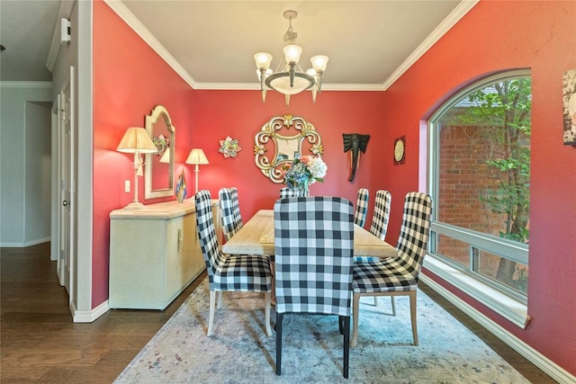 1414 Chisholm Trl, Weatherford, OK 73096 - dining room featuring a chandelier, wood finished floors, and crown molding