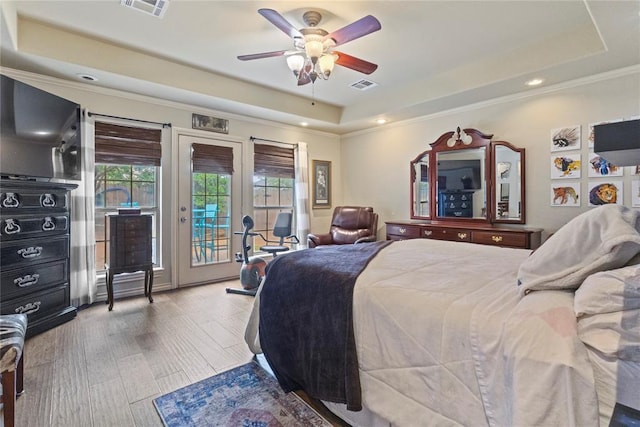 1414 Chisholm Trl, Weatherford, OK 73096 - bedroom with a raised ceiling, access to exterior, crown molding, recessed lighting, and ceiling fan