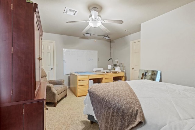 1414 Chisholm Trl, Weatherford, OK 73096 - bedroom featuring light colored carpet and a ceiling fan