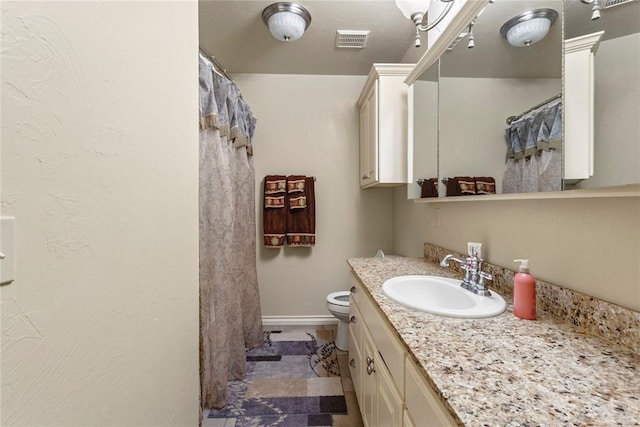 1414 Chisholm Trl, Weatherford, OK 73096 - bathroom with vanity and a shower with shower curtain