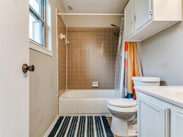 401 NW 120th St, Oklahoma City, OK 73114 - bathroom featuring shower / tub combo with curtain, vanity, a textured wall, and tile patterned floors