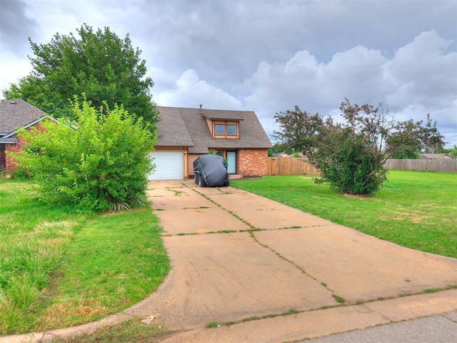 401 NW 120th St, Oklahoma City, OK 73114 - view of front of home with concrete driveway, a garage, brick siding, and a shingled roof