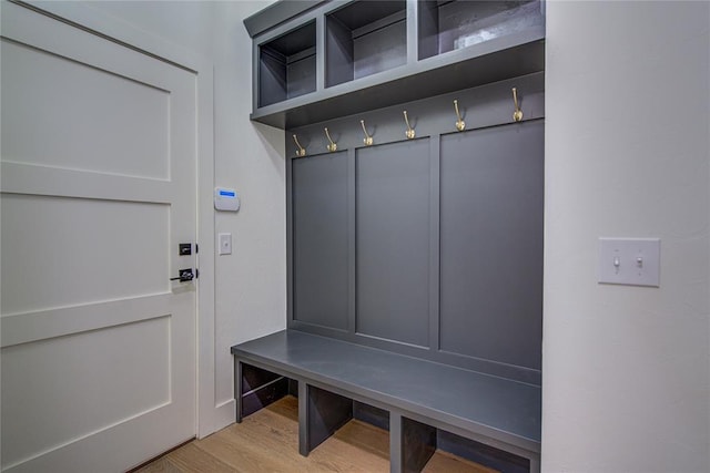 2006 Ithaca Dr, Norman, OK 73071 - mudroom featuring wood finished floors and baseboards
