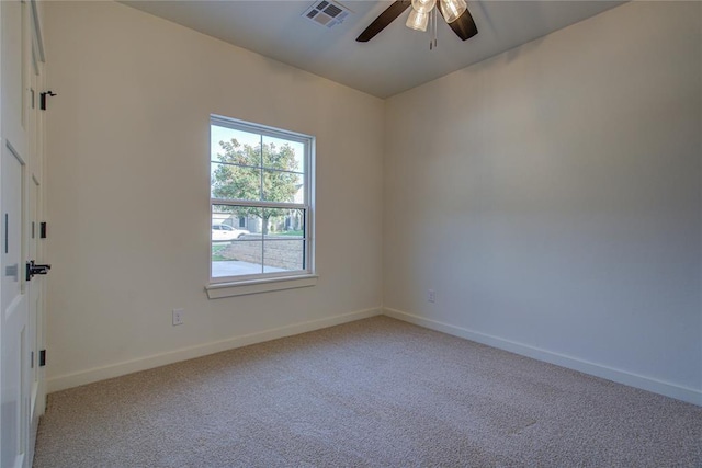 2006 Ithaca Dr, Norman, OK 73071 - spare room with ceiling fan and light carpet