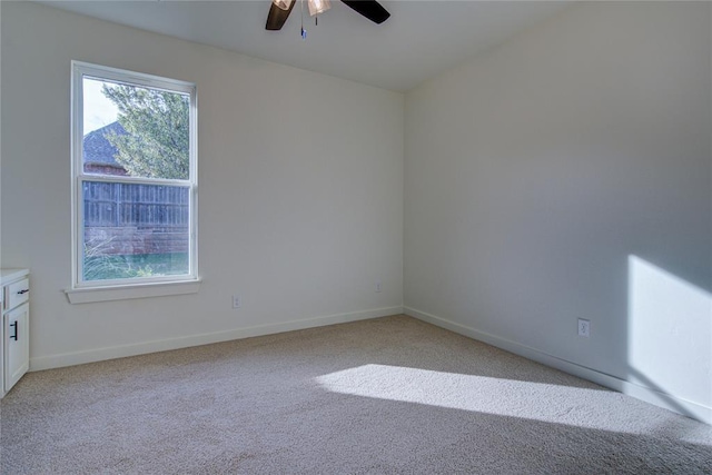 2006 Ithaca Dr, Norman, OK 73071 - empty room featuring ceiling fan and light carpet