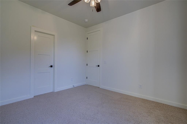 2006 Ithaca Dr, Norman, OK 73071 - empty room with ceiling fan, light carpet, and a smoke detector