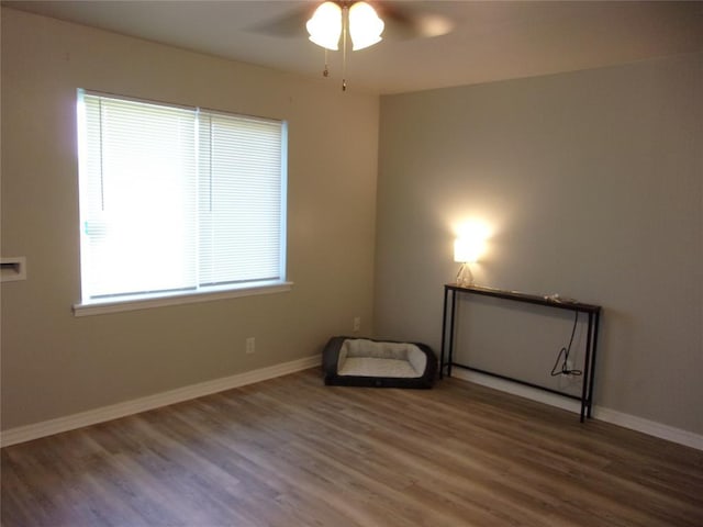 3018 N Beard Ave, Shawnee, OK 74804 - unfurnished room featuring wood finished floors and a ceiling fan