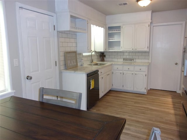 3018 N Beard Ave, Shawnee, OK 74804 - kitchen featuring black dishwasher, white cabinetry, tasteful backsplash, open shelves, and light countertops