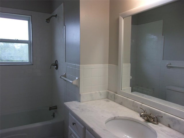 3018 N Beard Ave, Shawnee, OK 74804 - bathroom with vanity,  shower combination, and wainscoting
