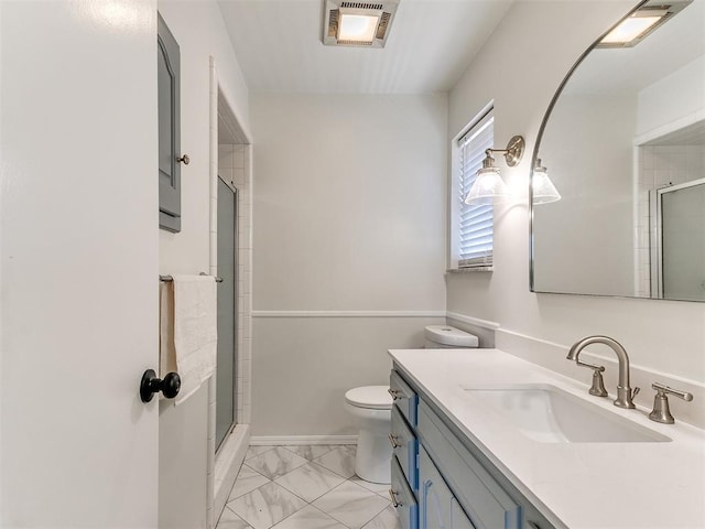 2317 NW 119th St, Oklahoma City, OK 73120 - bathroom featuring vanity, marble finish flooring, and a shower with shower door