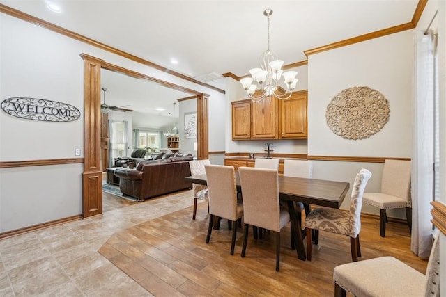12409 Gaylon Cir, Oklahoma City, OK 73170 - dining room with a chandelier, crown molding, and recessed lighting