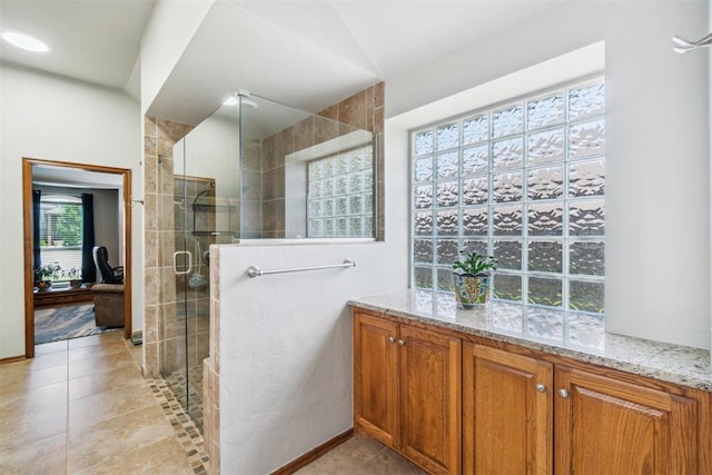 12409 Gaylon Cir, Oklahoma City, OK 73170 - ensuite bathroom featuring a shower stall and tile patterned flooring