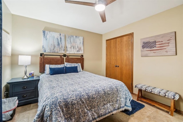 12409 Gaylon Cir, Oklahoma City, OK 73170 - tiled bedroom featuring a ceiling fan and a closet