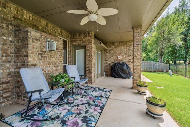 12409 Gaylon Cir, Oklahoma City, OK 73170 - fenced backyard featuring area for grilling, ceiling fan, and a patio