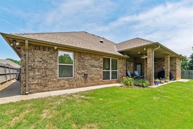 12409 Gaylon Cir, Oklahoma City, OK 73170 - rear view of house featuring a ceiling fan, a patio area, brick siding, and roof with shingles