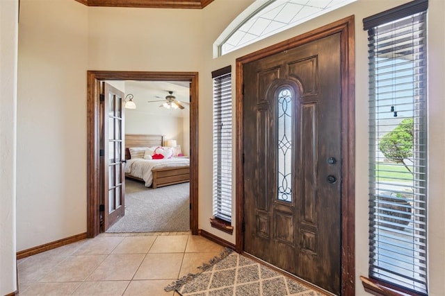 1600 SW 123rd St, Oklahoma City, OK 73170 - entrance foyer featuring light colored carpet and light tile patterned flooring