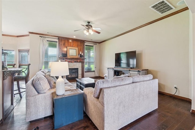 1600 SW 123rd St, Oklahoma City, OK 73170 - living area featuring ornamental molding, ceiling fan, dark wood-style floors, and a fireplace